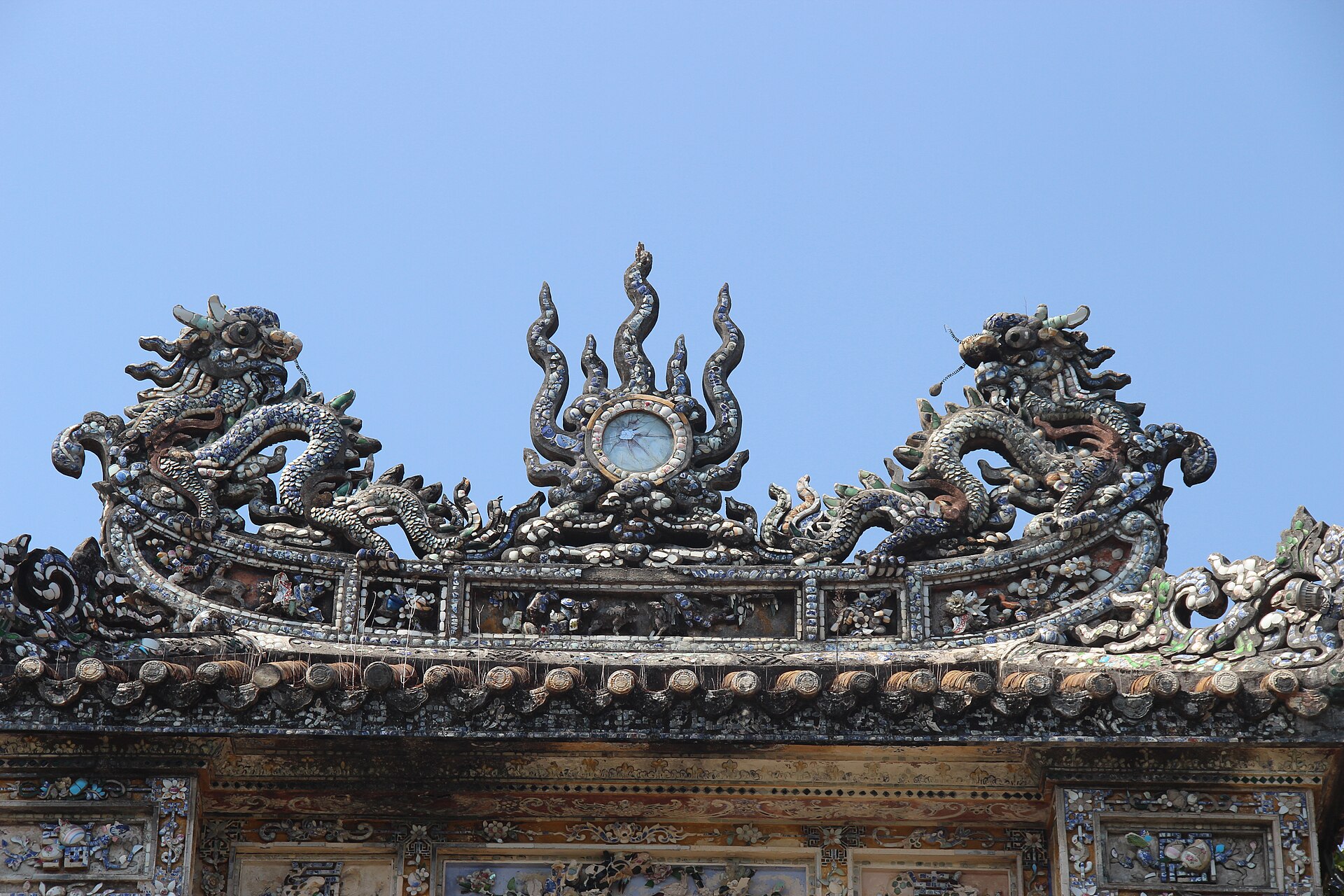 Carved dragons on a gate of the Imperial City in Hue