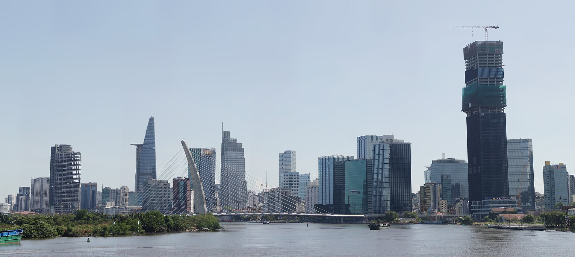 The skyline of Ho Chi Minh City across the Saigon River